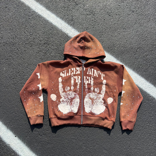 Brown handprint zip