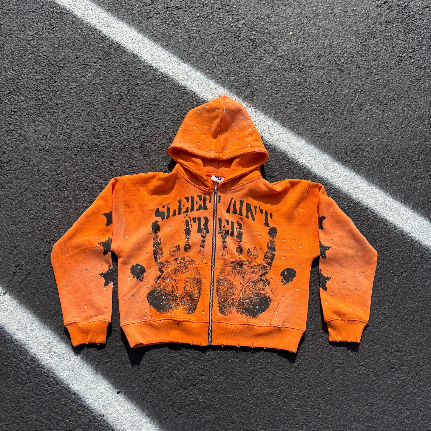 Orange handprint zip