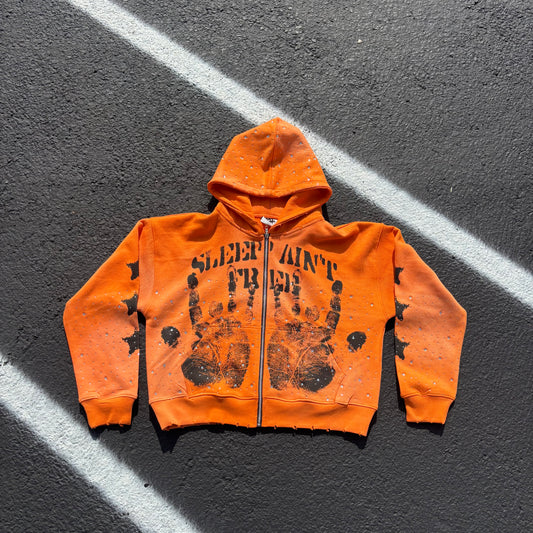 Orange handprint zip